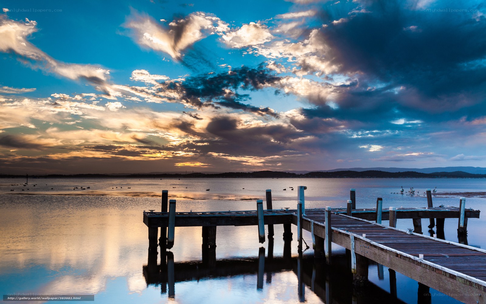Sunset at the wooden pier