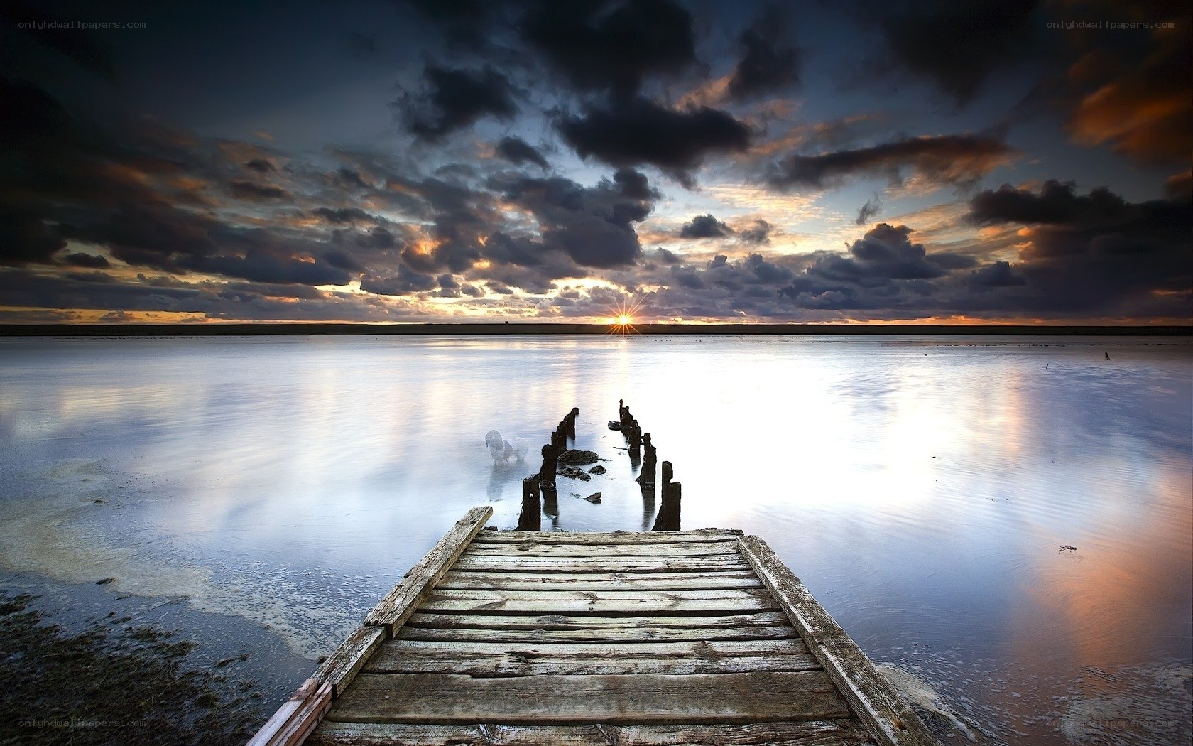 Sunset at the wooden pier