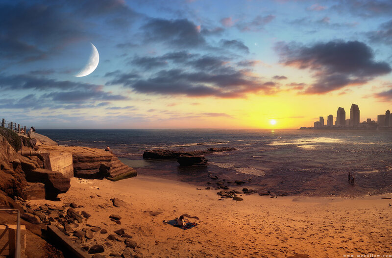 Sunset beach with city skyline