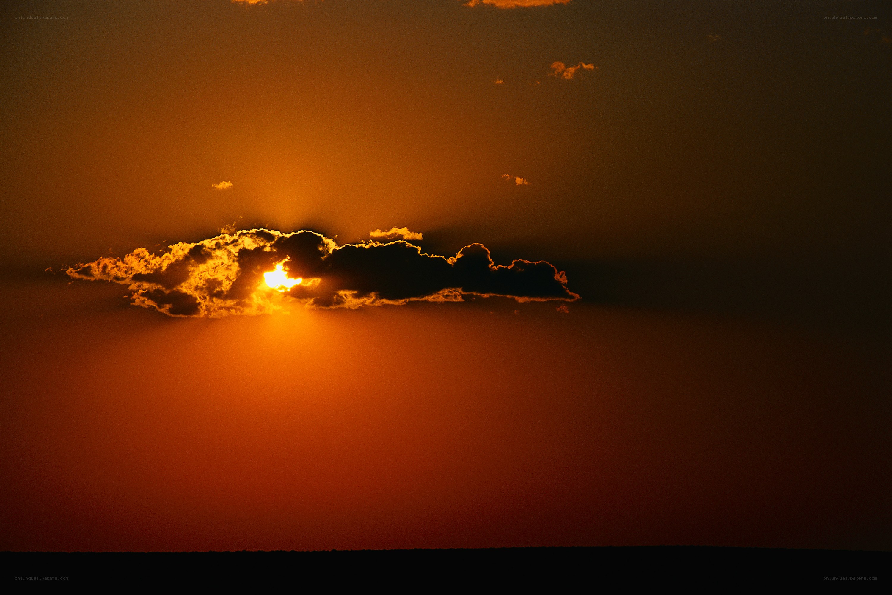 Sunset behind a cloud