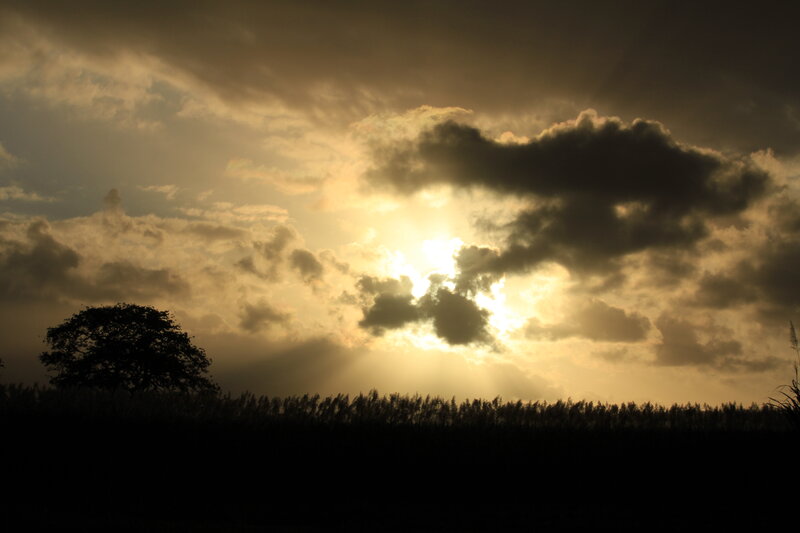 Sunset behind clouds