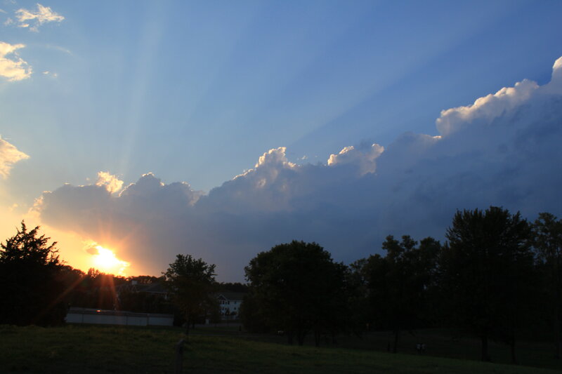 Sunset behind clouds