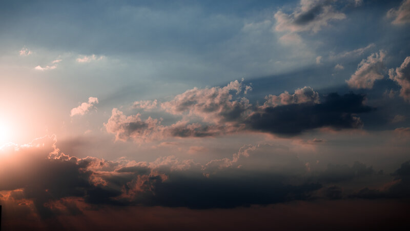 Sunset Behind Clouds — Blue, Dramatic