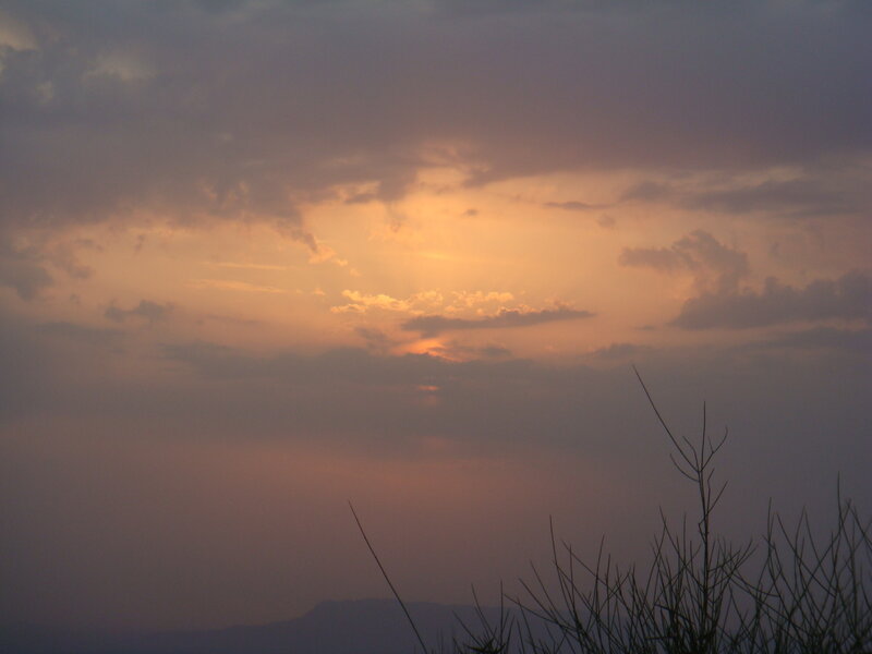 Sunset Behind Clouds — Orange, Serene