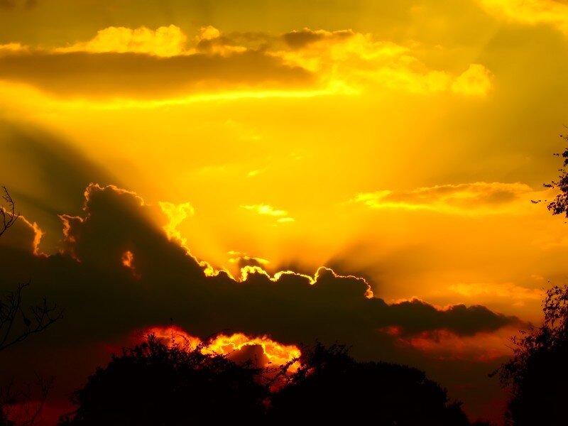 Sunset Behind Clouds — Yellow, Dramatic