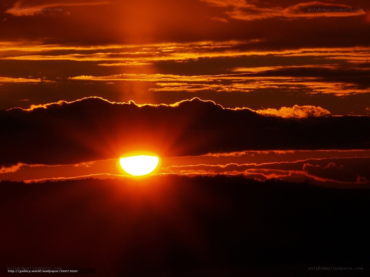 Sunset behind clouds