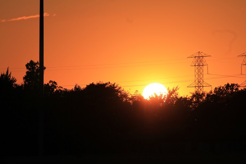 Sunset behind power lines