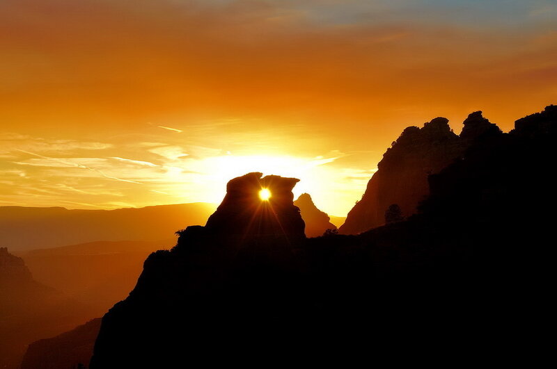 Sunset behind rock formations