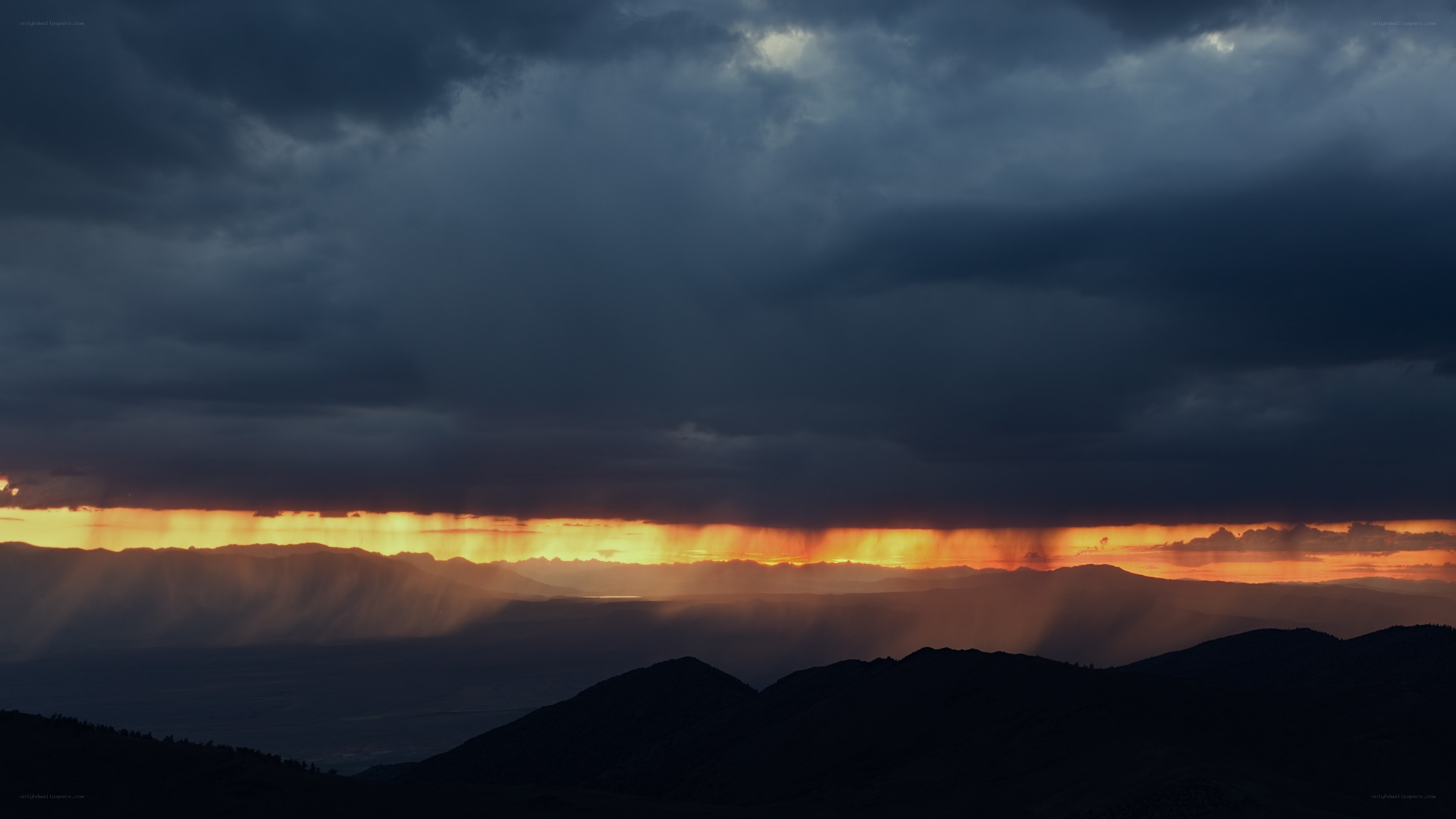 Sunset behind storm clouds