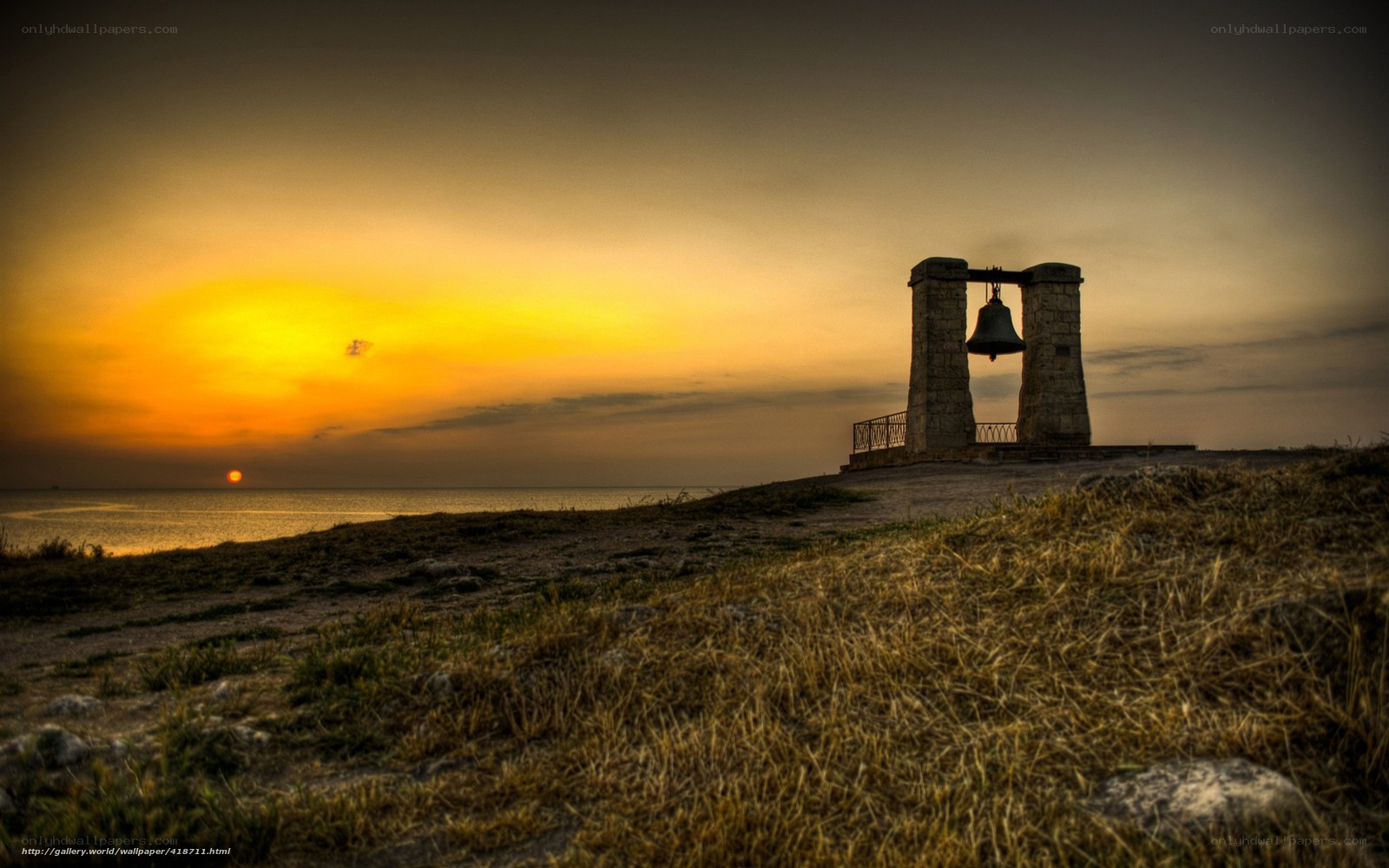 Sunset bell tower by the sea