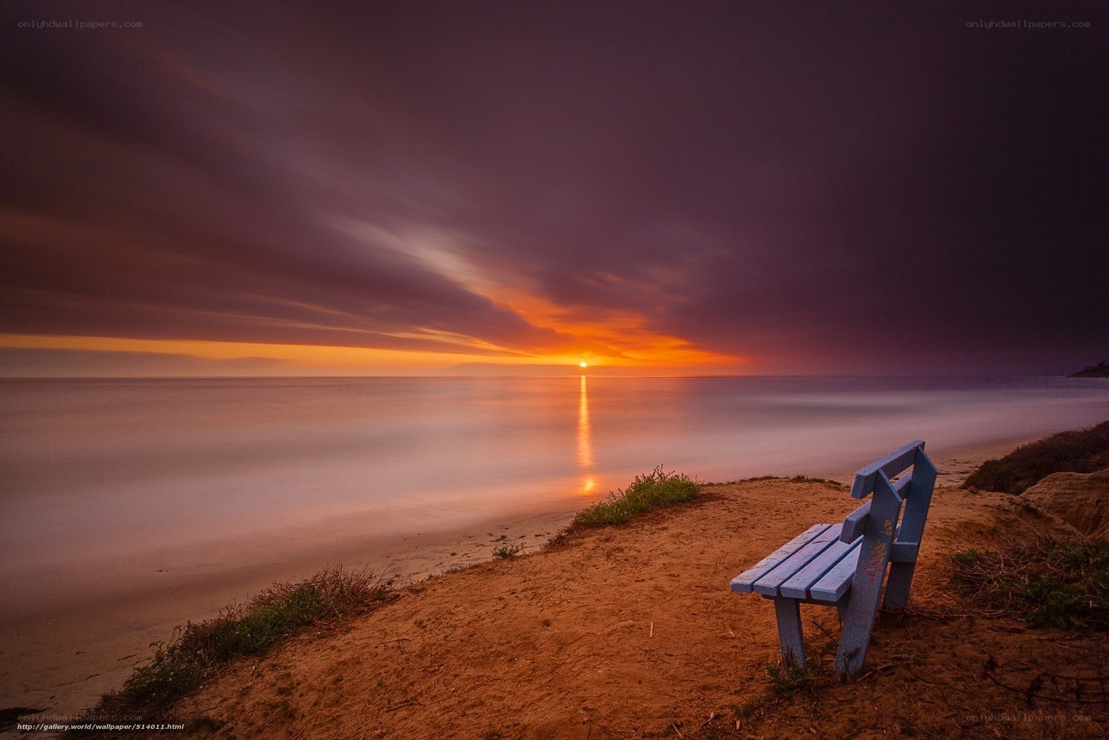 Sunset bench by the sea