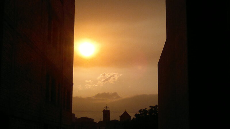 Sunset Between Buildings — Orange