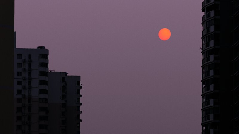 Sunset Between Buildings — Purple