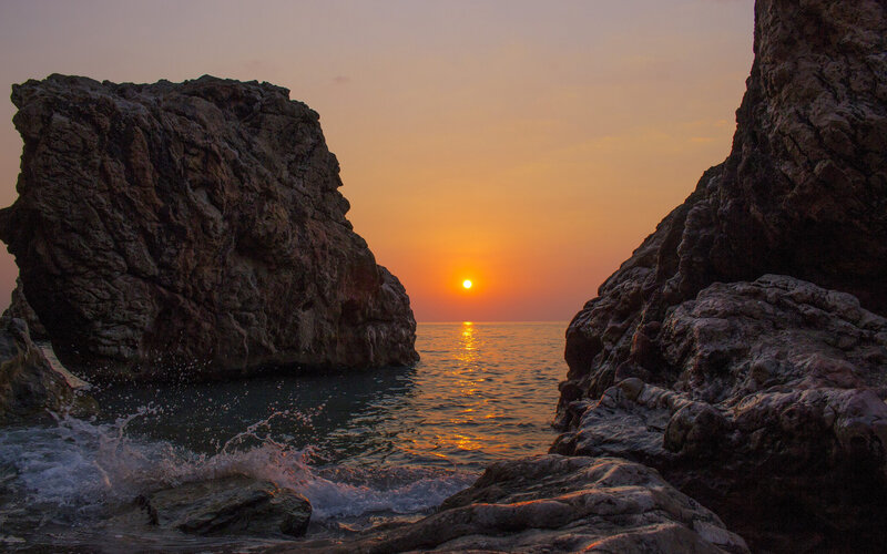 Sunset Between Rocks — Orange