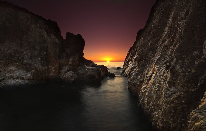 Sunset Between Rocks — Purple