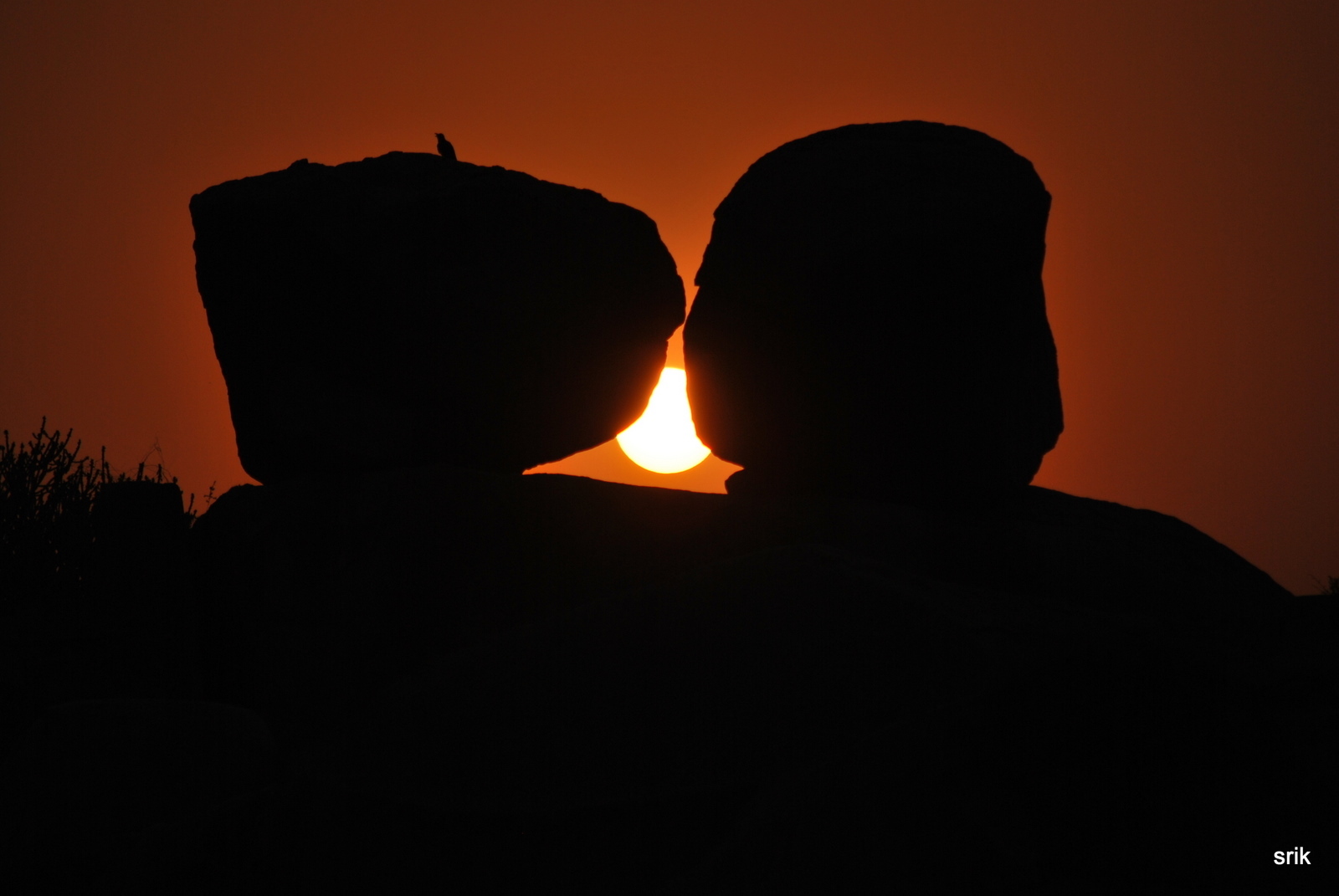 Sunset between rocks