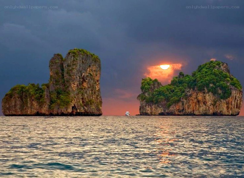 Sunset between two islands