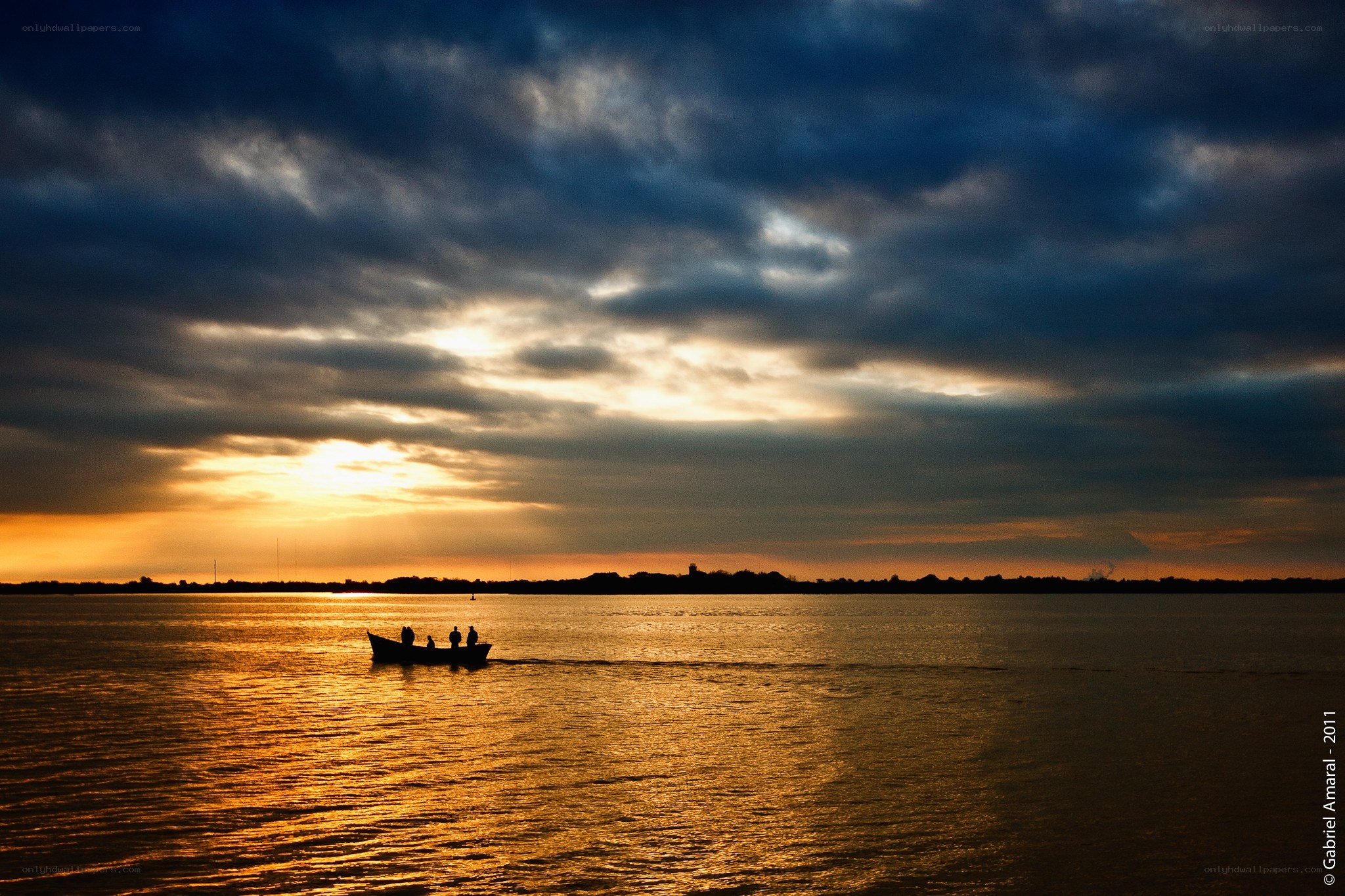 Sunset boat on calm water