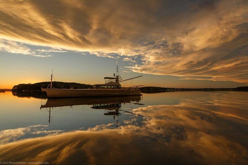 Sunset boat reflection