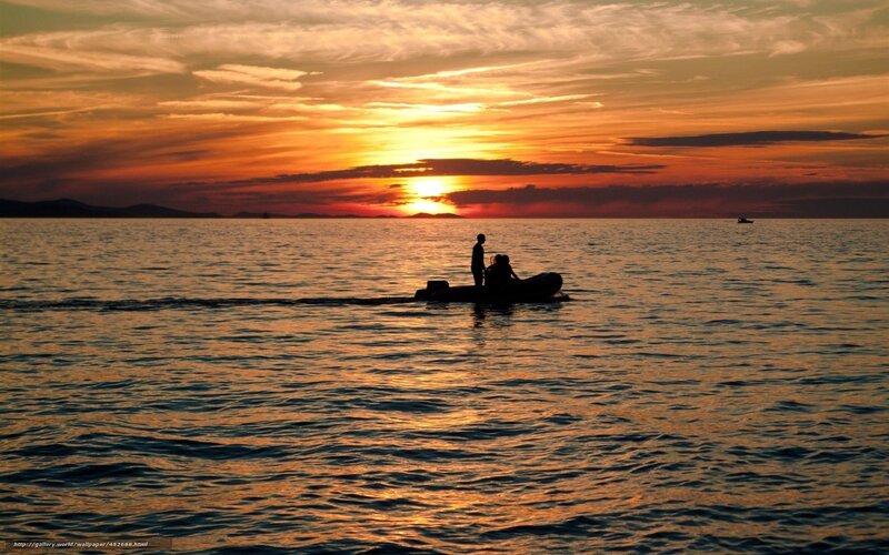 Sunset boat silhouette