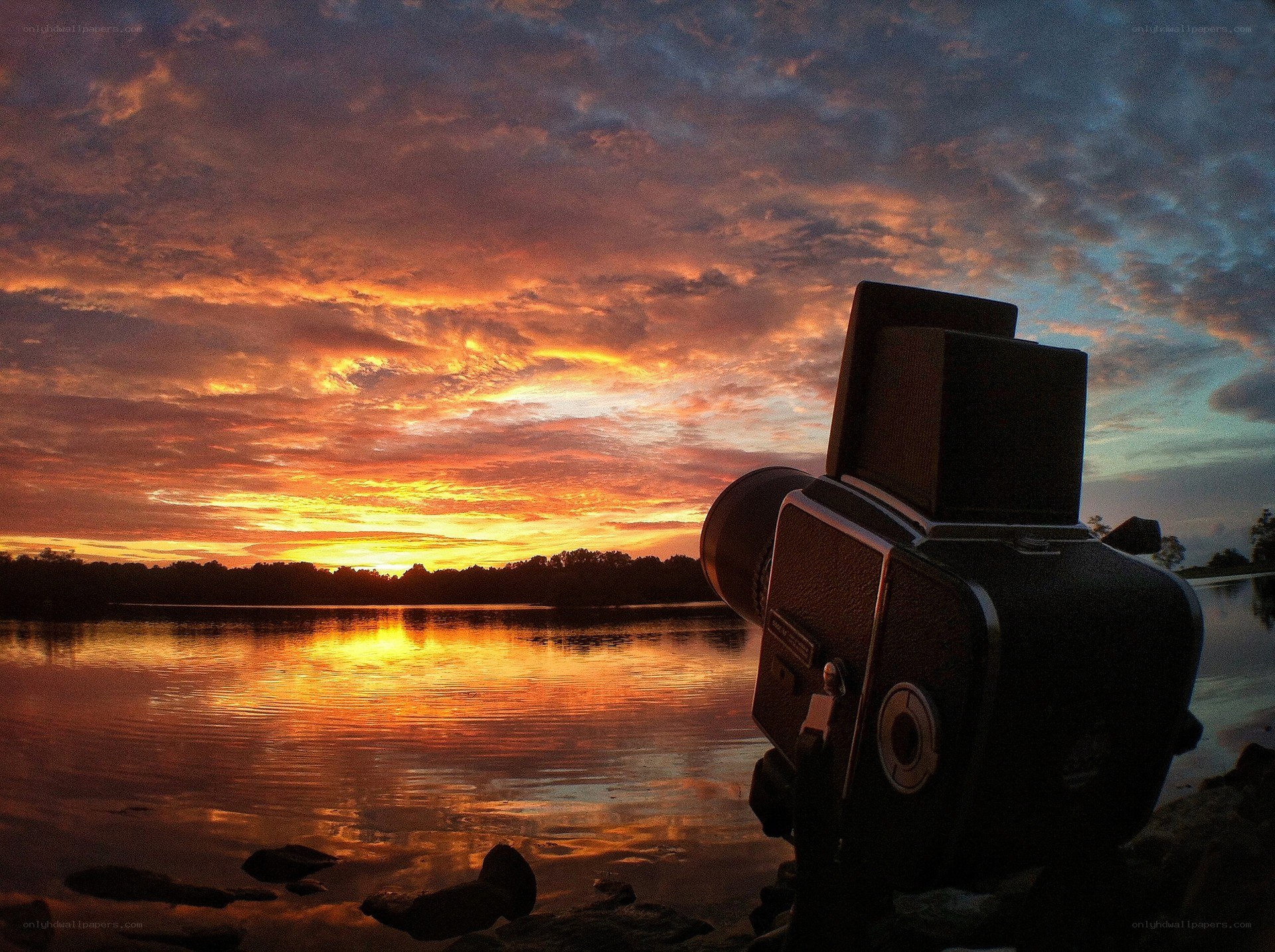 Sunset by the lake with camera