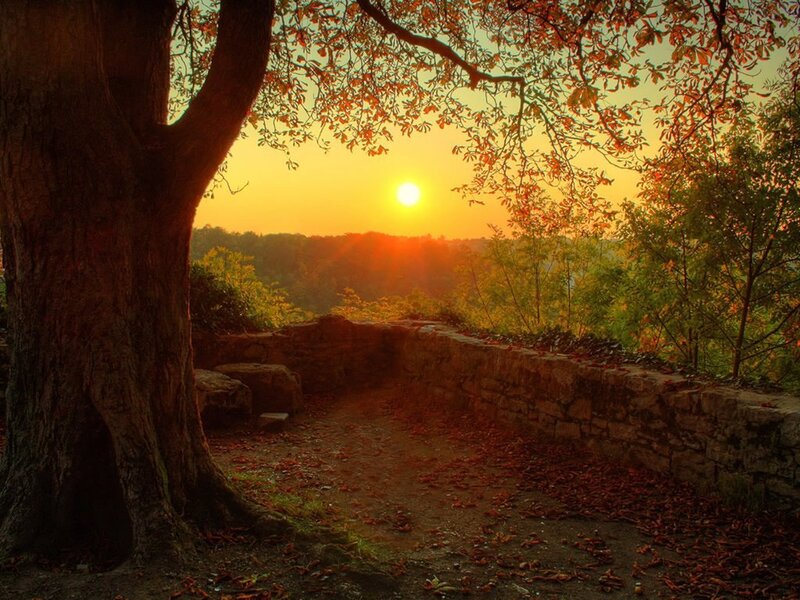 Sunset by the old stone wall