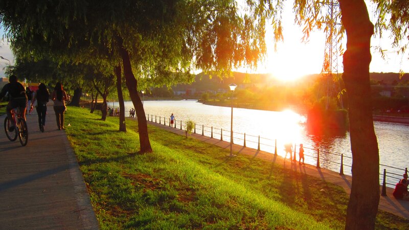 Sunset by the river park