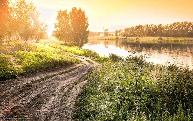 Sunset by the river path