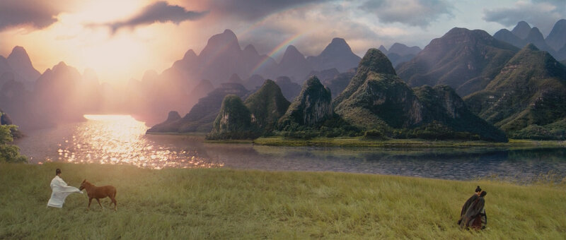 Sunset by the river with mountains