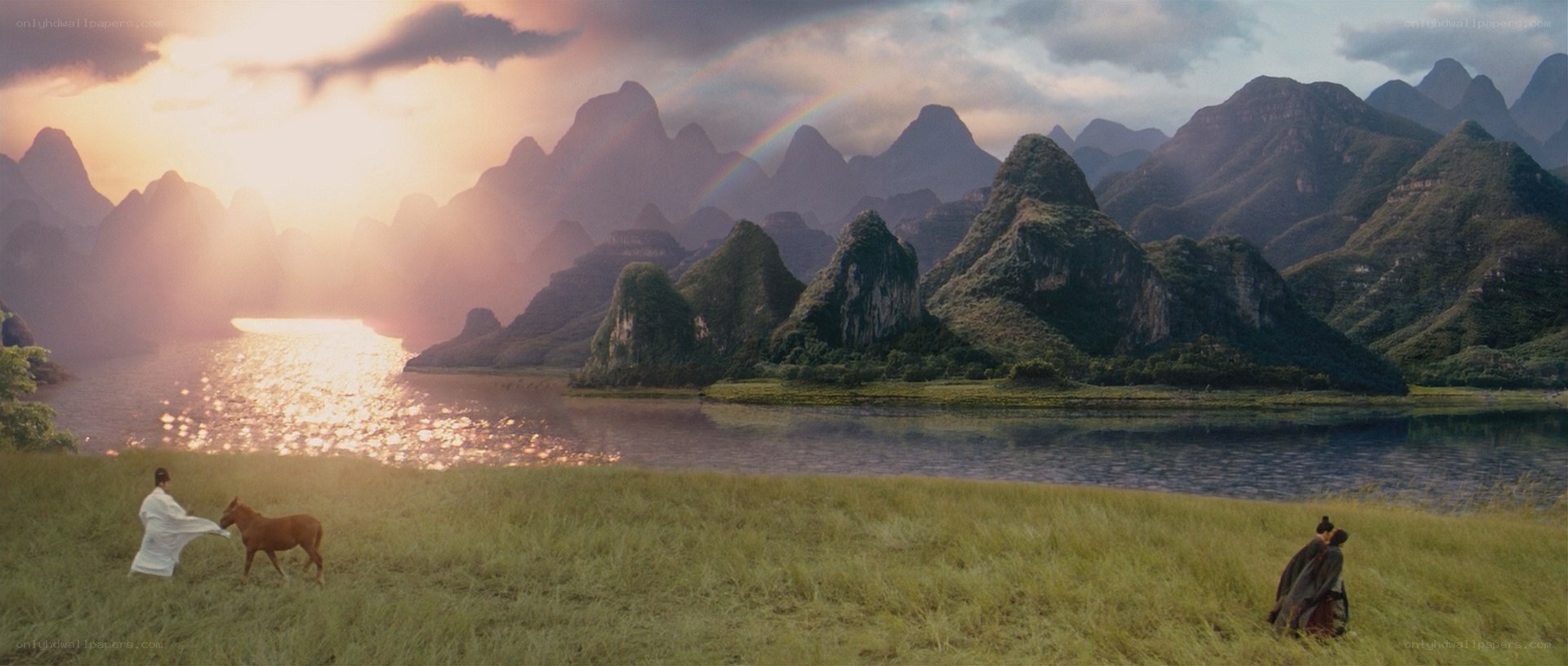 Sunset by the river with mountains