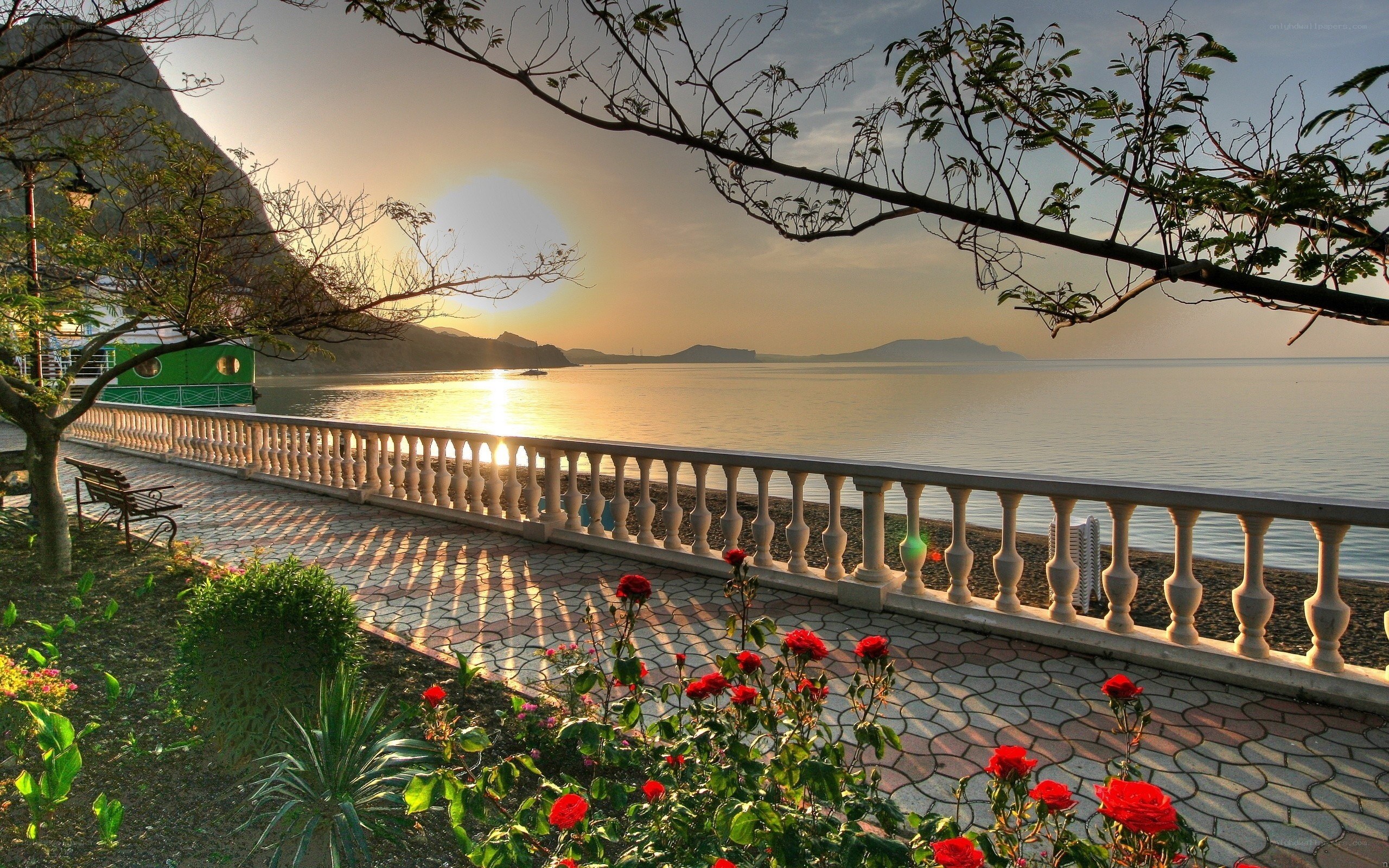Sunset by the sea promenade