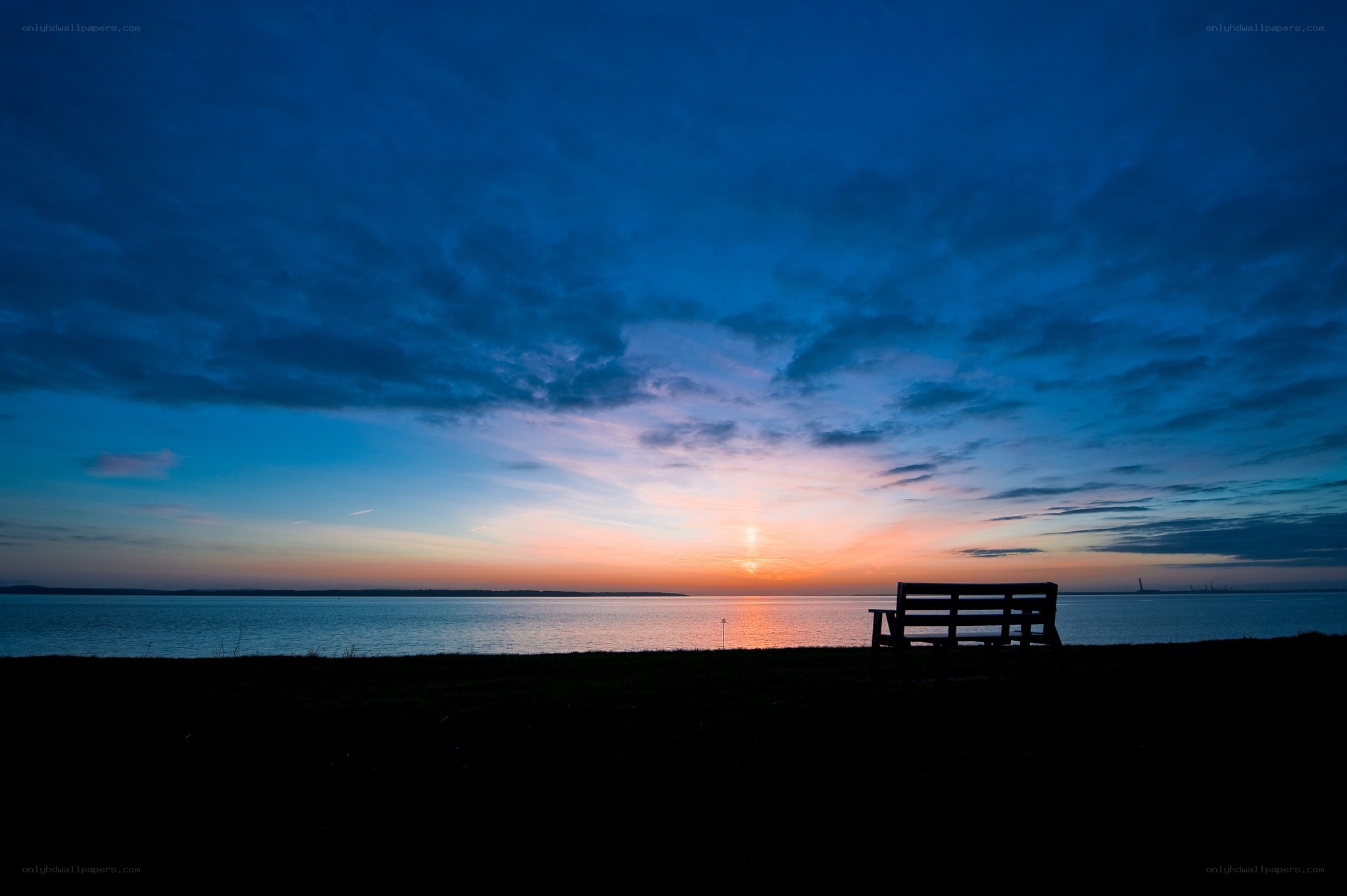 Sunset by the water