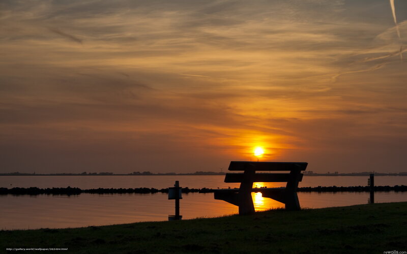 Sunset by the water