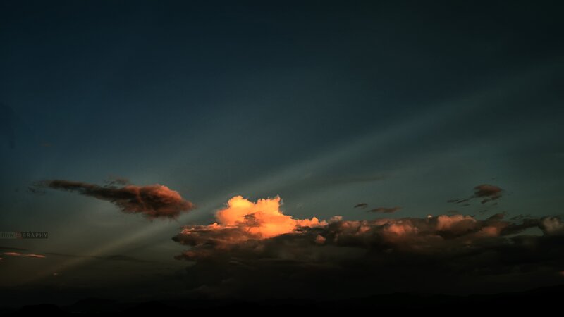 Sunset clouds with light rays