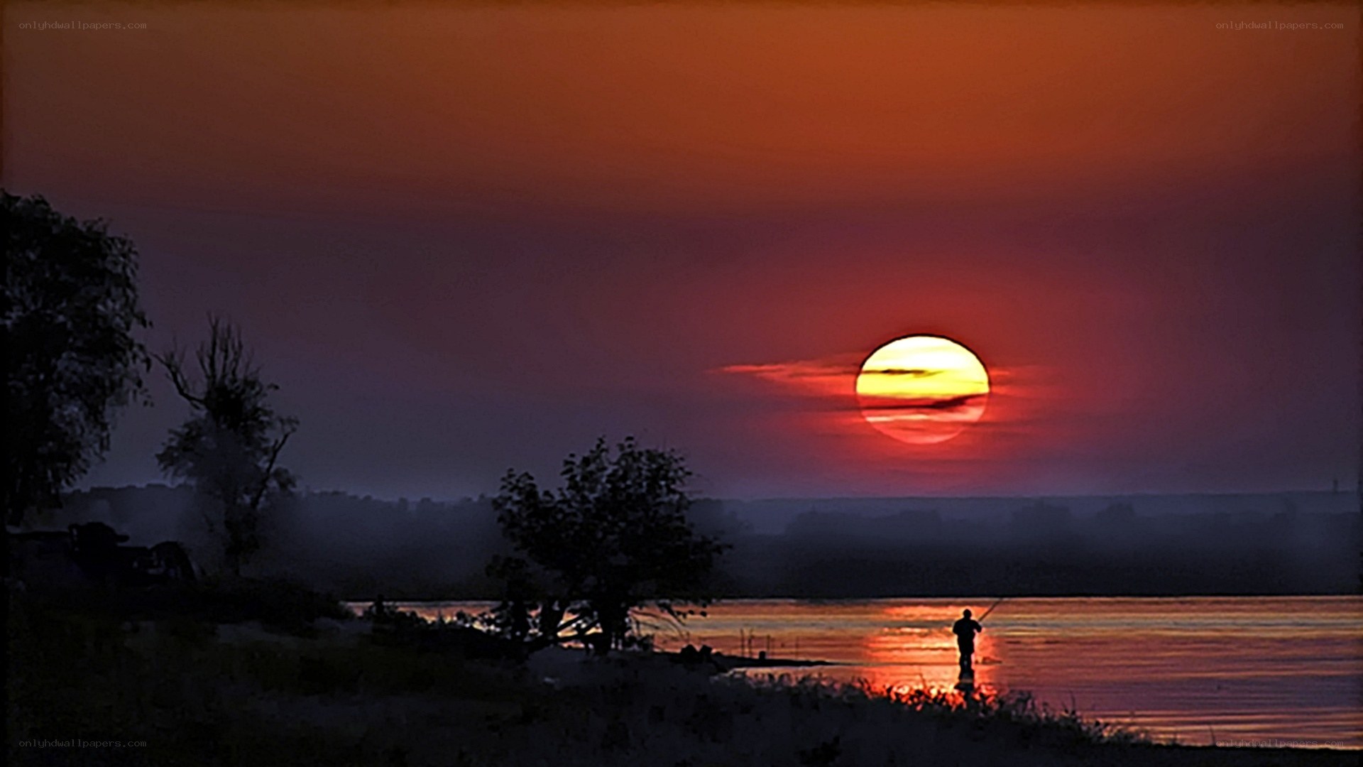 Sunset fisherman silhouette