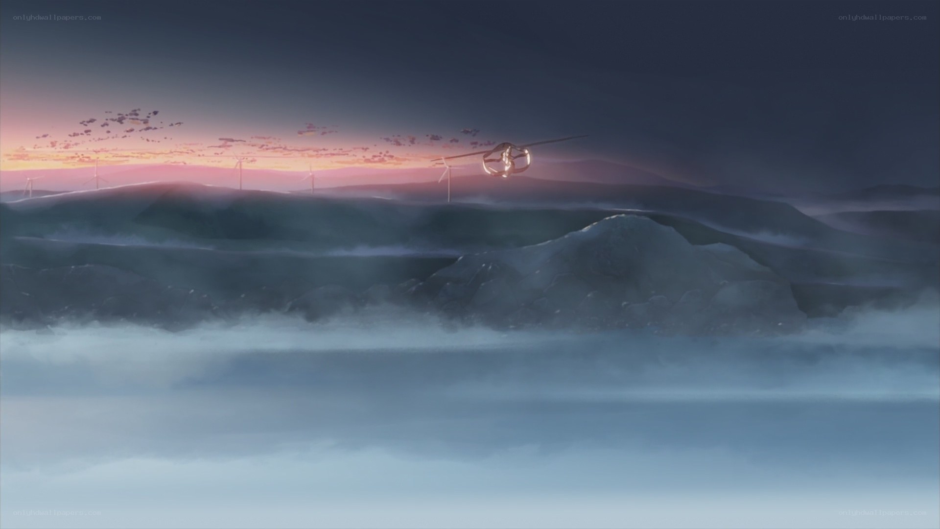 sunset flight over misty hills