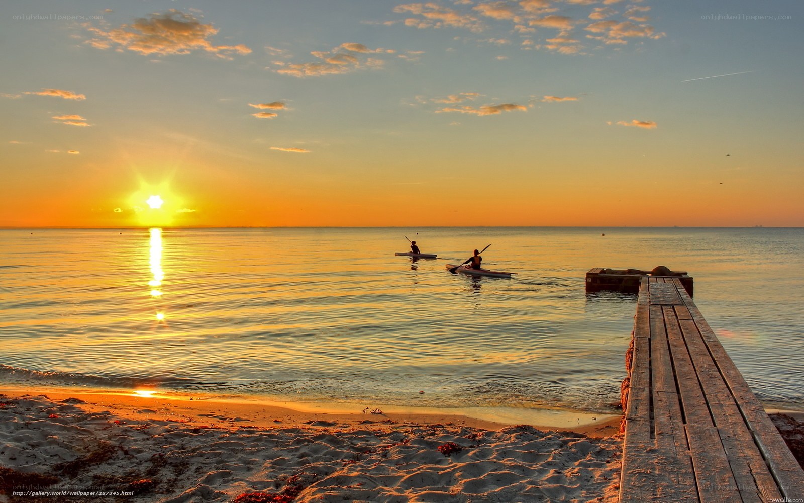 Sunset kayaking on calm water