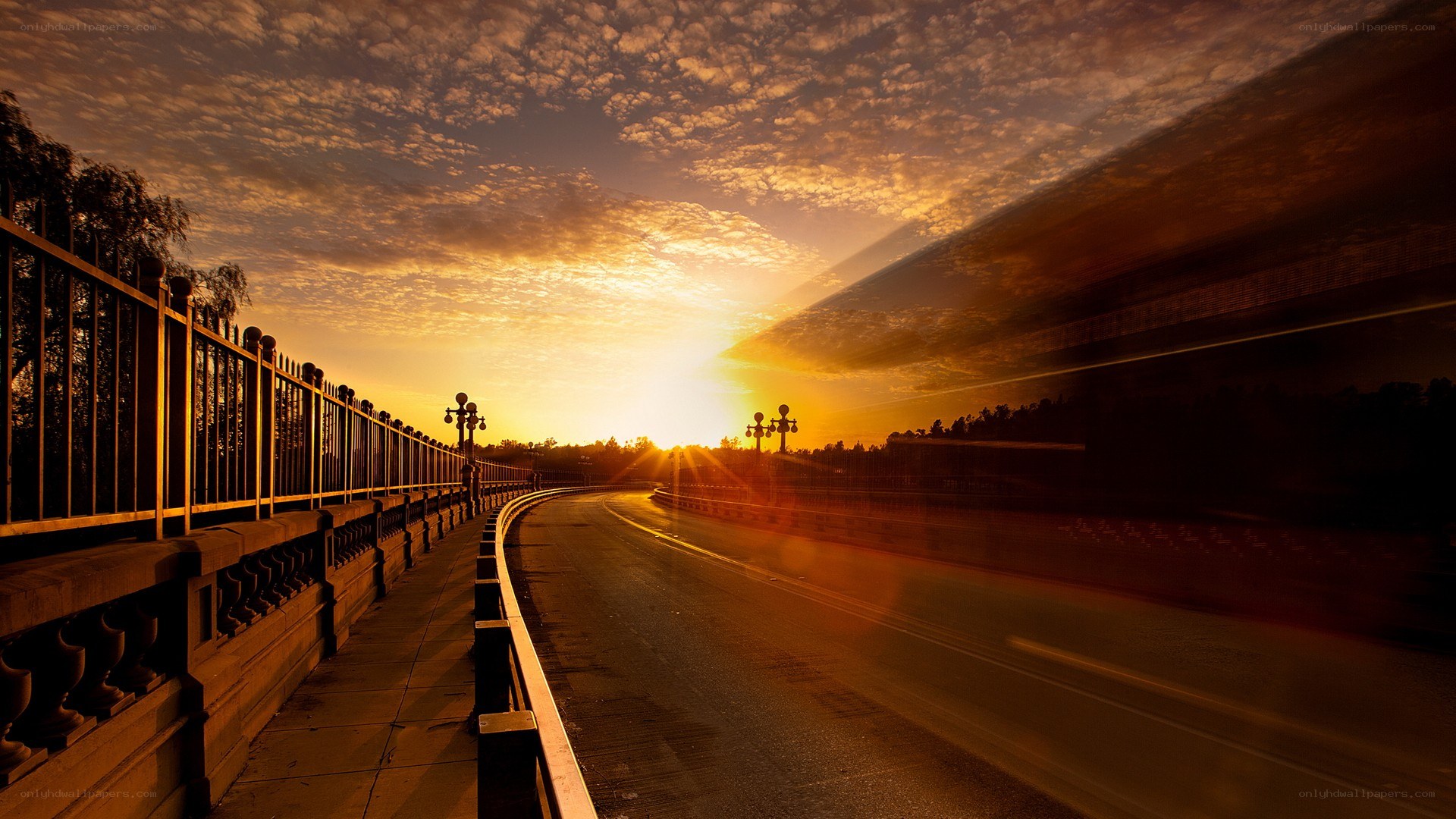 Sunset on a curved road