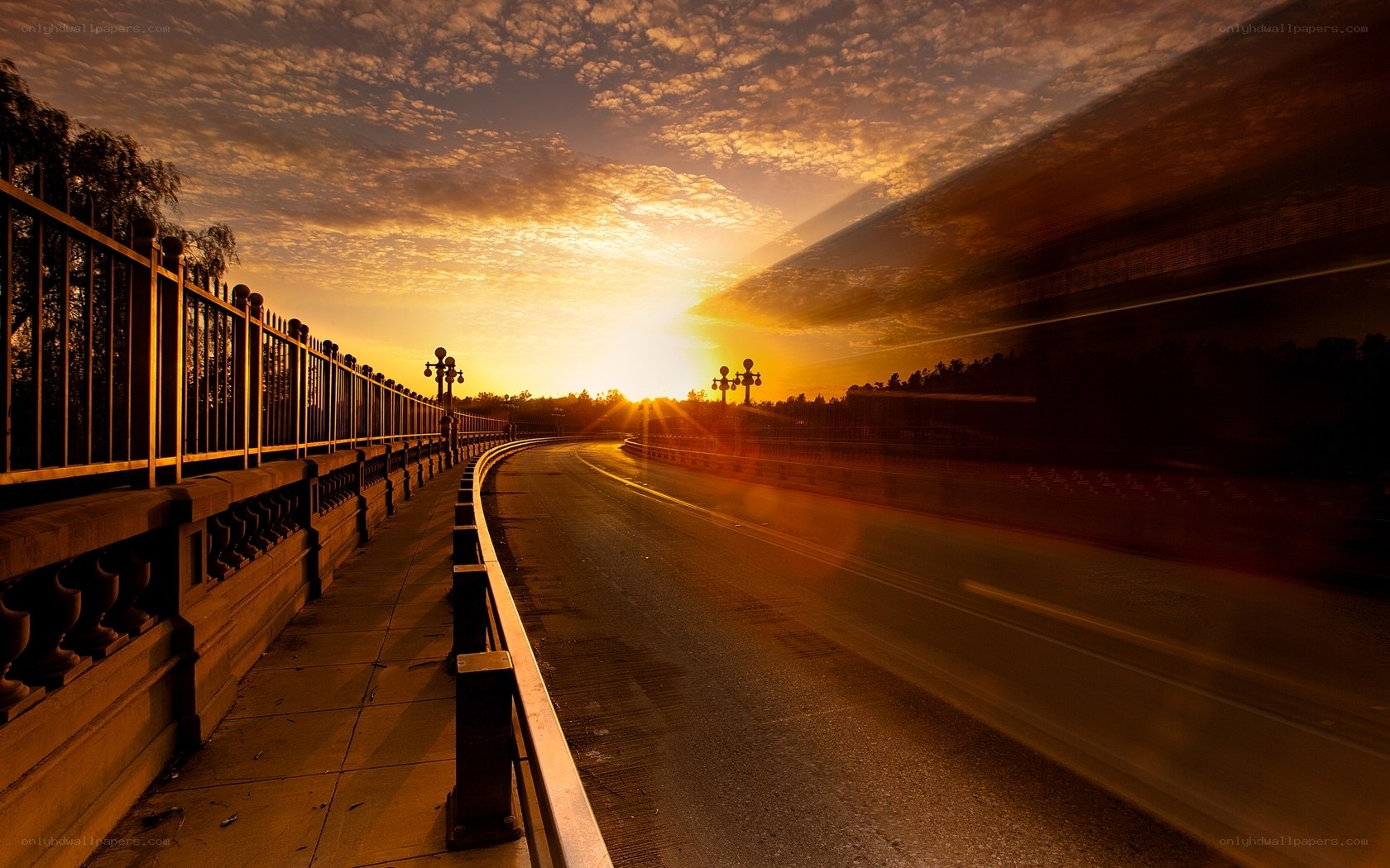 Sunset on a Curved Road