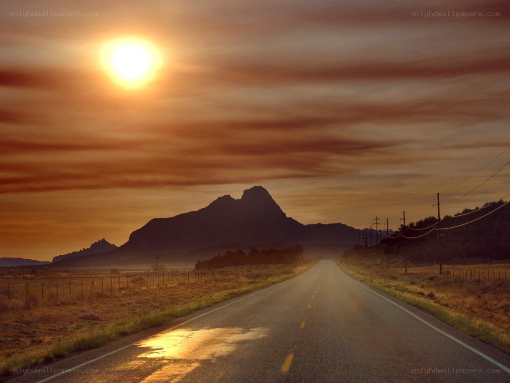 Sunset on a desert road