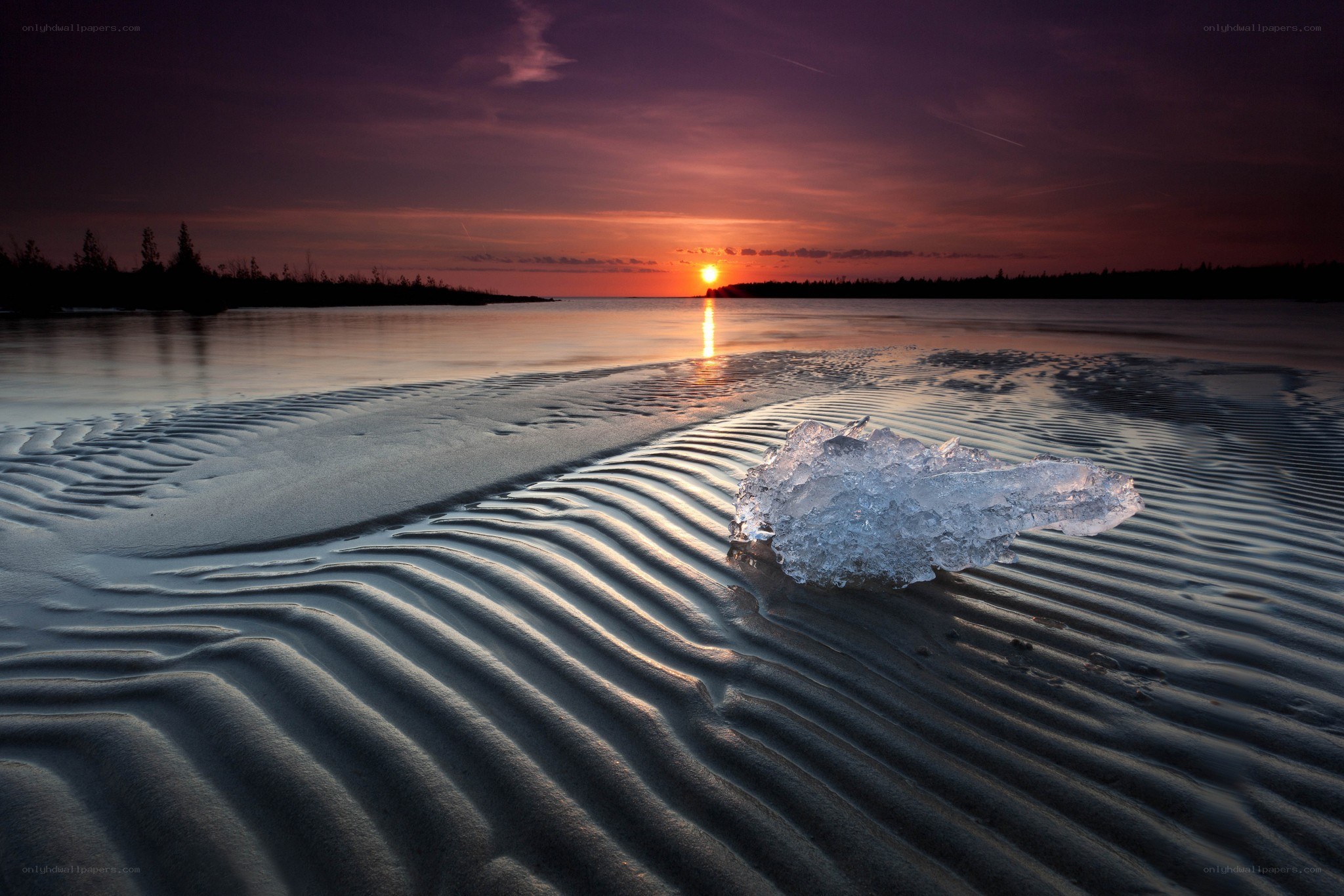 Sunset on a frozen beach