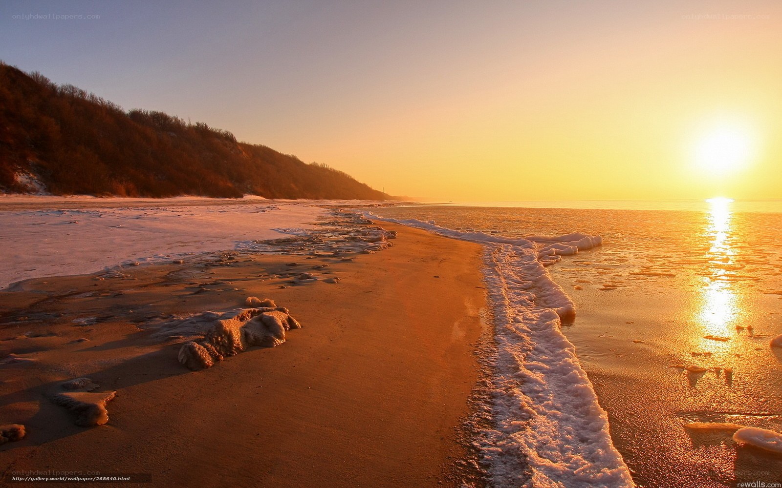 sunset on a frozen beach
