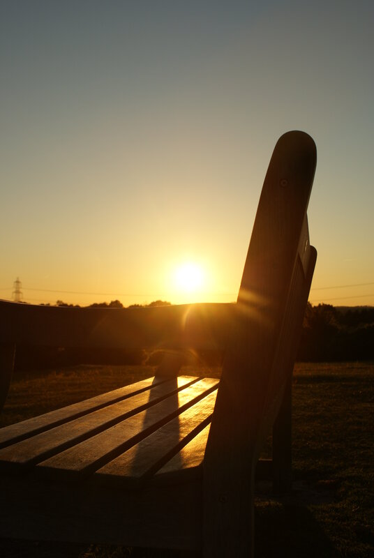 Sunset on a park bench