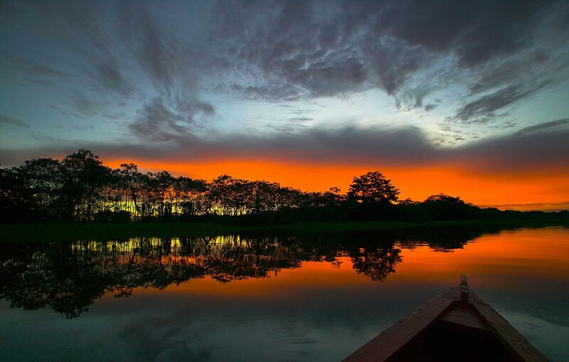 Sunset on a river at dusk