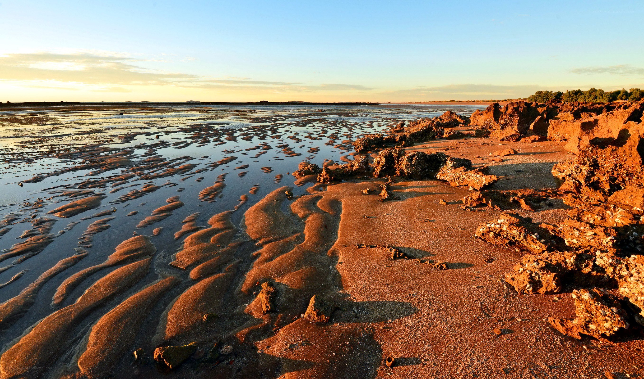 Sunset on a rocky beach
