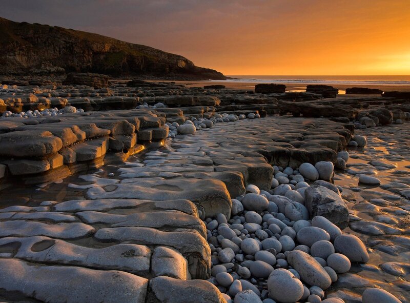 Sunset on a rocky beach