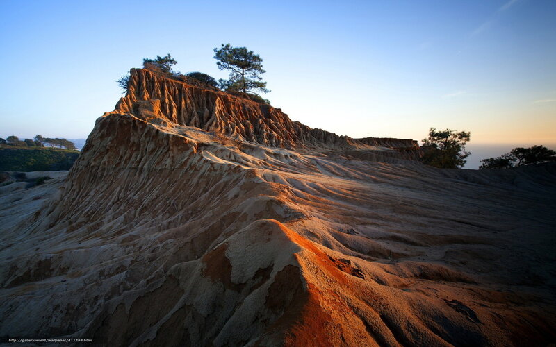 Sunset on a rocky cliff