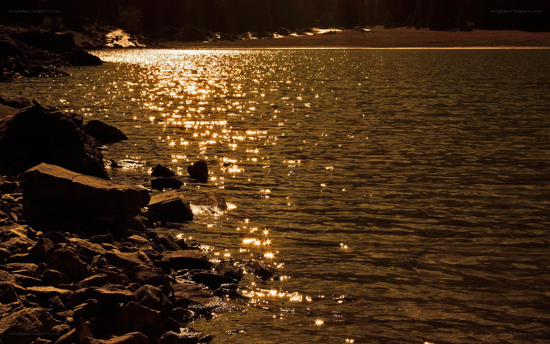 Sunset on a rocky lake