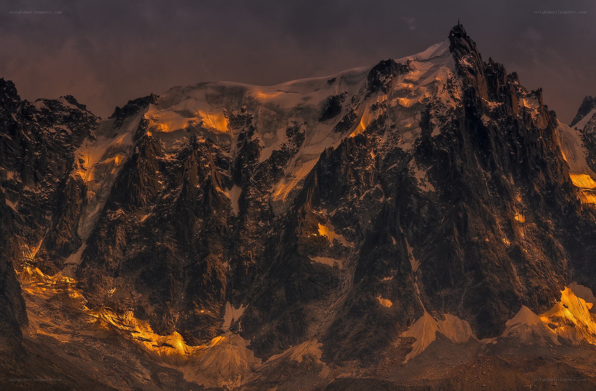 Sunset on a snow-capped mountain