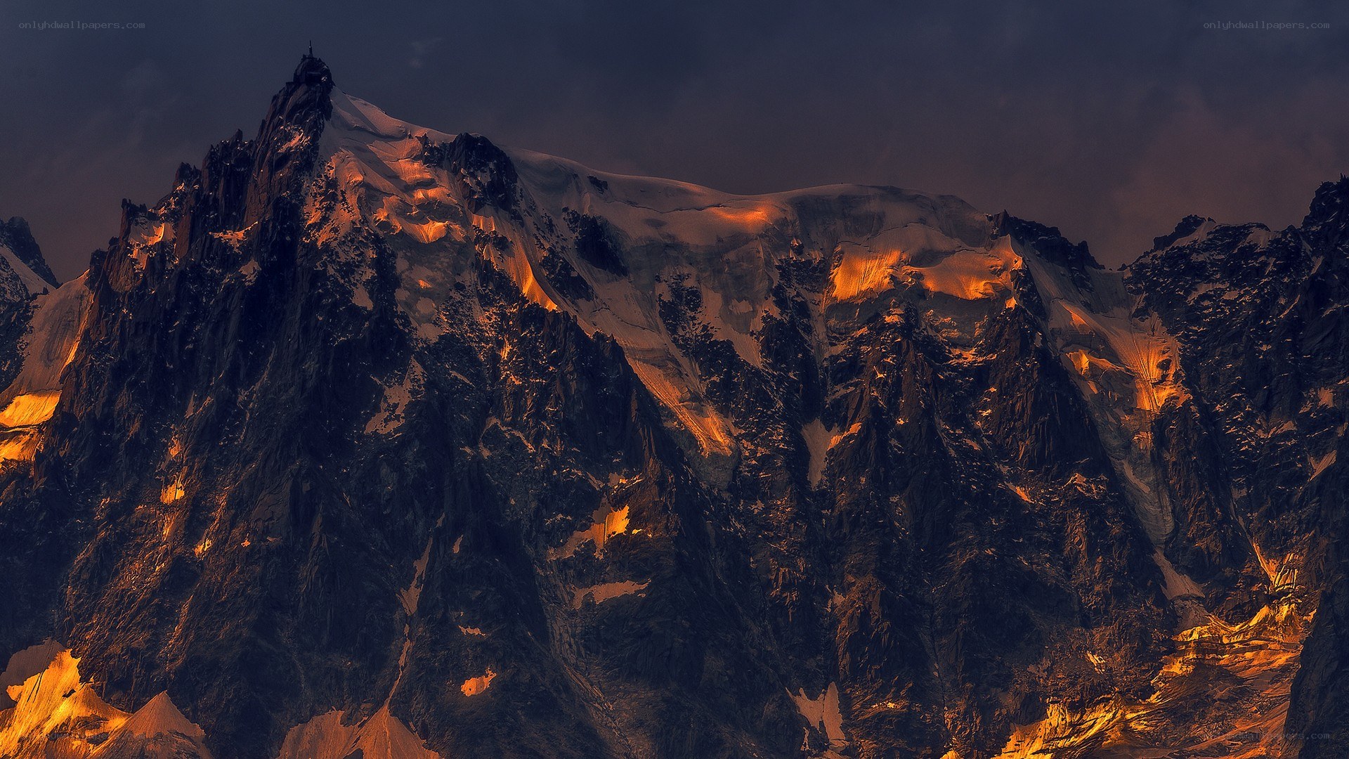 Sunset on a snow-capped mountain